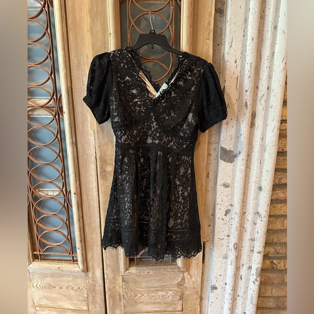Size medium black lace, V neck mini dress